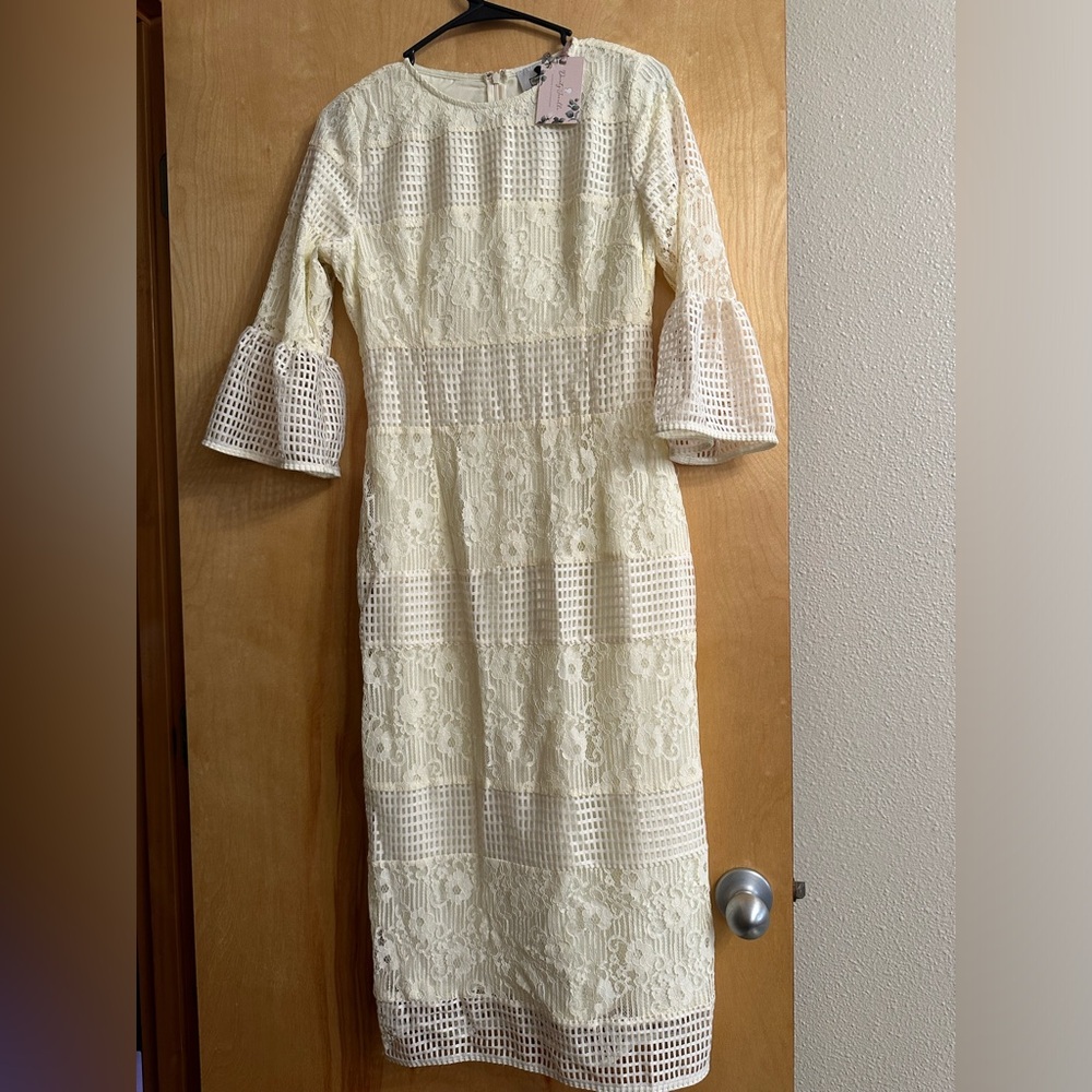 Dainty Jewels cream spring/summer dress. Size small. NWT.